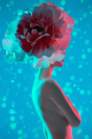 A stunning beautiful girl with a large peony flower on her head poses on a blue background with bubbles and pink light. Skin and body care. Cosmetics and perfumery.の写真素材