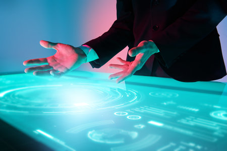 Business technology of the future. Business analyst works with holographic data of the market, stock...