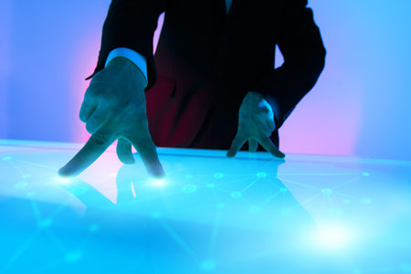 Modern virtual digital technologies. Business concept. A man in a suit touches a digital virtual...