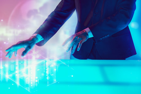 The concept of business and modern virtual digital technologies. A man in a suit works with a...
