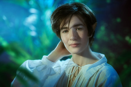 Fairy tale, magic. Portrait of a handsome fairy elf boy. Fantasy.