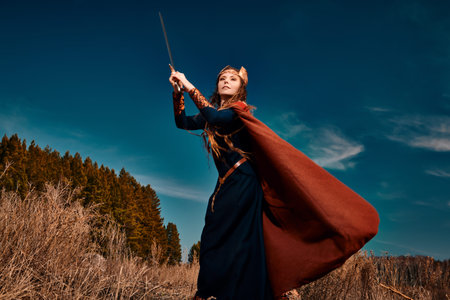 Scandinavian mythology. Divine female warrior Valkyrie fights with a sword in her hands on the...