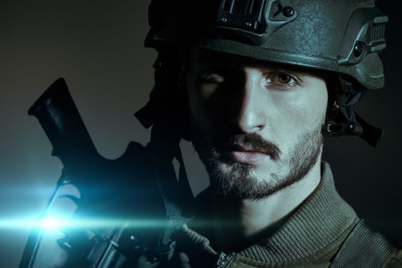 Portrait of a courageous soldier in Combat Uniform and helmet looking calmly and resolutely at the...