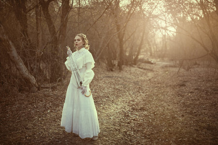 Historical reconstruction of the Victorian era. Portrait of a beautiful noble lady in a white dress...