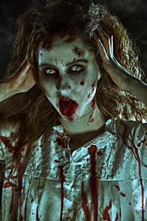 Portrait of a bloodthirsty zombie woman with faded eyes opening her bloody mouth. Devil possessed...