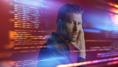 A thoughtful mature man stands on a red background with holographic data. Modern information...