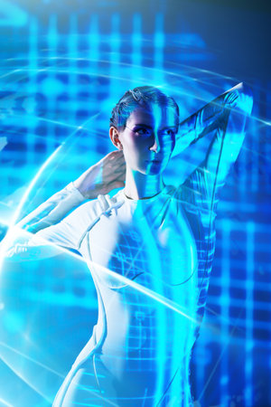 Digital technologies of the future. Perfect cyber girl in futuristic tech overalls stands in a digital hologram and neon blue light. Cyberspace. Virtual reality games.の写真素材