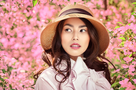 Sunny day and happy spring mood. Women's beauty and spring. Close-up portrait of a beautiful tender...