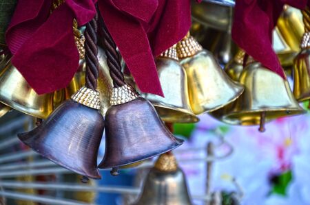 Bells of different metals and colors  These can be used in places of worship and home の写真素材
