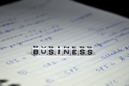 Business Text on Management notebook