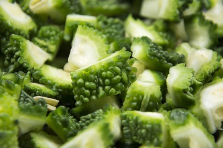 Bitter gourd chopped in pieces  Green and yelow colors of the objects  の写真素材