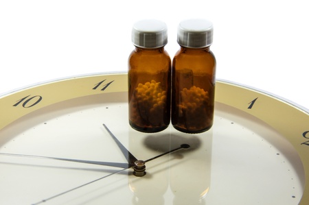 Medicine time for being healthy again  The theme is accessible and isolated on white background  の写真素材