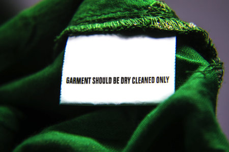 Dry clean only instructions for cloth washing  White tag on the cloth  