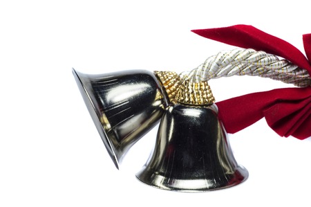 Two exotic christmas bells and rope on white background  の写真素材