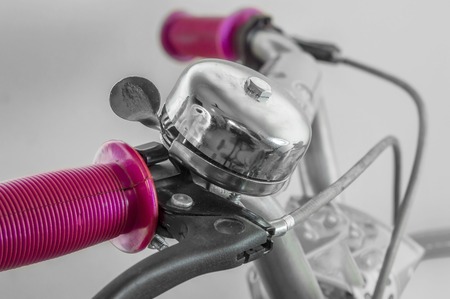 Metal bell on handlebar of cycle or bike. の写真素材