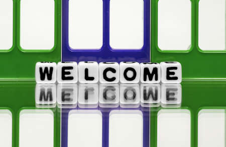 Green blue gates and welcome text on white background  の写真素材