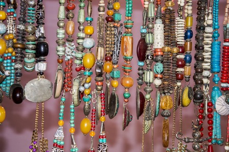 Necklaces of various precious beads on sale.の写真素材