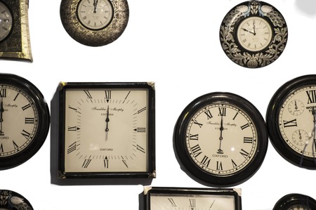 Wall clocks on sale at a shop.の写真素材