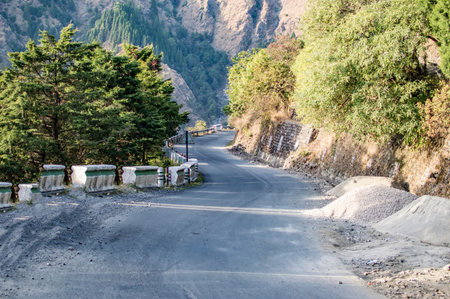 Sand stone road in valley going downward.