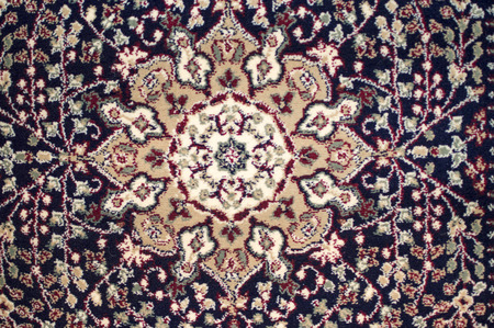Single design on carpet of wool and other items on saleの写真素材