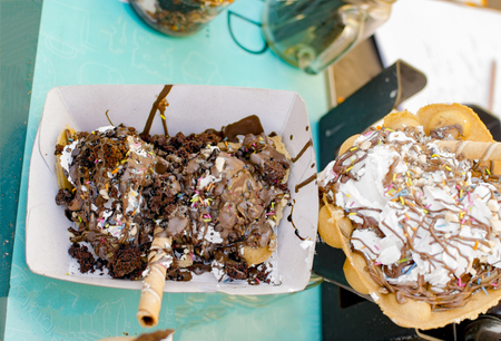 Tasty ice cream on bread base and chocolate coverの写真素材
