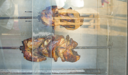 Roasted chicken on steak and grill at bbqの写真素材