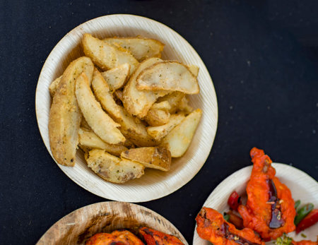 Potato wedges in plate for sale at a restaurant
