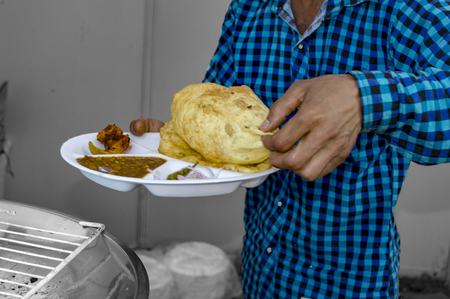 Selling Indian chole bhature at one restaurantの写真素材