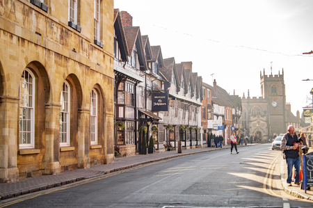 Main town street in stratford upon avon and buildings at the sides of roadのeditorial素材