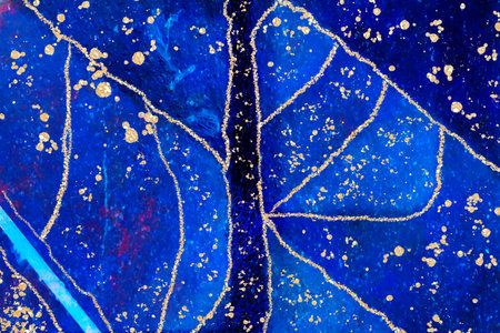 Blue sections and patches of Alcohol ink fluid abstract art with gold glitter and shades
