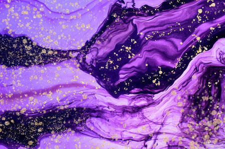 Deep and dark purple and black in in water. Golden dust and drops on Alcohol ink fluid abstract...