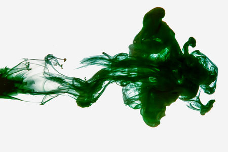Deep green ink in water with smokey design. Alcohol ink fluid abstract texture fluid art and liquid with shades.の写真素材