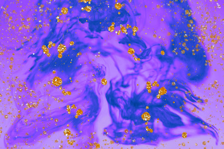 Drops of golden Alcohol ink fluid abstract texture fluid art with gold glitter and liquid with shades.の写真素材