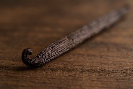 Vanilla pods on wooden background, close up. Selective focus.の素材