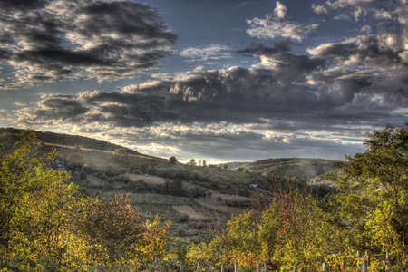 Beautiful image of stunning sunset with clouds and skyの写真素材