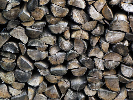 Pile of chopped fire wood prepared for winter の写真素材