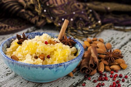 spicy couscous with herbs, oranges and almondsの写真素材