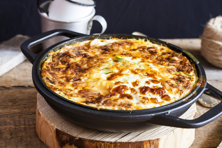 casserole of rice, vegetables, cheese and zucchiniの写真素材