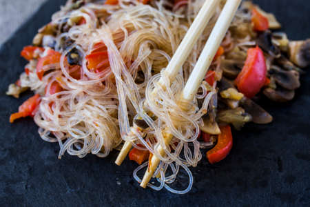Asian Noodles with colorful vegetables and mushroomsの写真素材