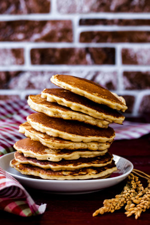 Homemade gluten free pancakes from rice flour coconut flakes