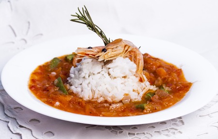 Louisiana soup gumbo with shrimp and tomatoesの写真素材