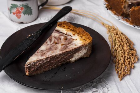 marble cheesecake with cream cheese and chocolate in a rustic styleの写真素材