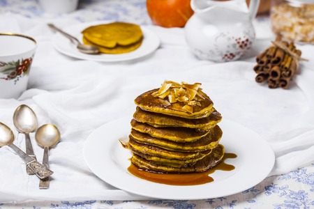 pumpkin pancakes with orange juice and cinnamonの写真素材