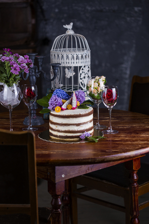 chocolate cake with butter cream in rustic styleの写真素材