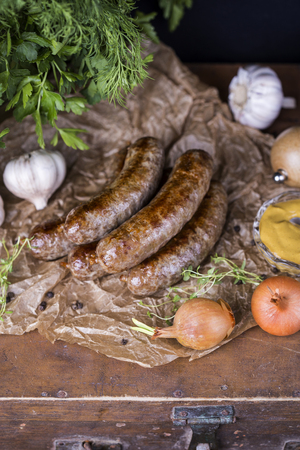 Homemade sausage of beef and venison in a rustic styleの写真素材