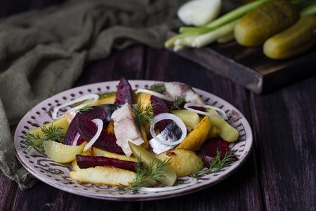 warm salad with potatoes, beetroot and smoked mackerelの写真素材