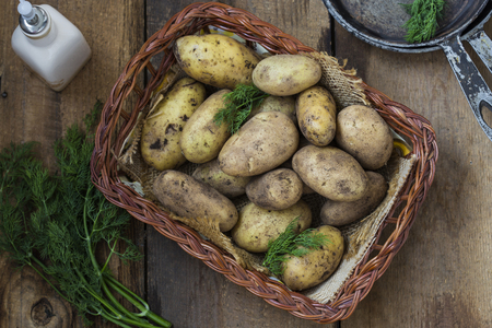 Potatoes on a rustic backgroundの写真素材