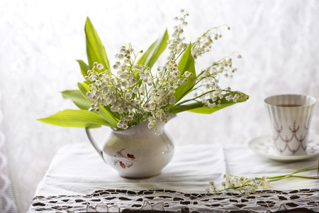 Lily of the valley bouquet on light backgroundの写真素材