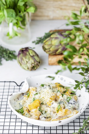 Italian pumpkin gnocchi with mushroom nd cream sauceの写真素材