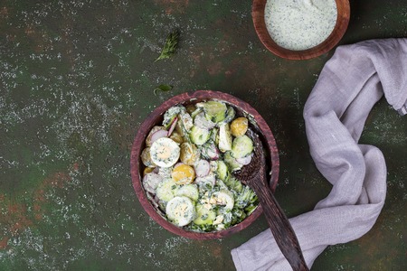 vitamin spring potato salad with egg,radishes and cucumbersの写真素材